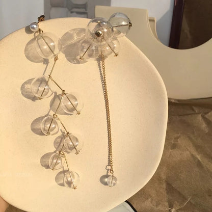Lange Ohrringe mit Glasperlen und zartem Kettendetail