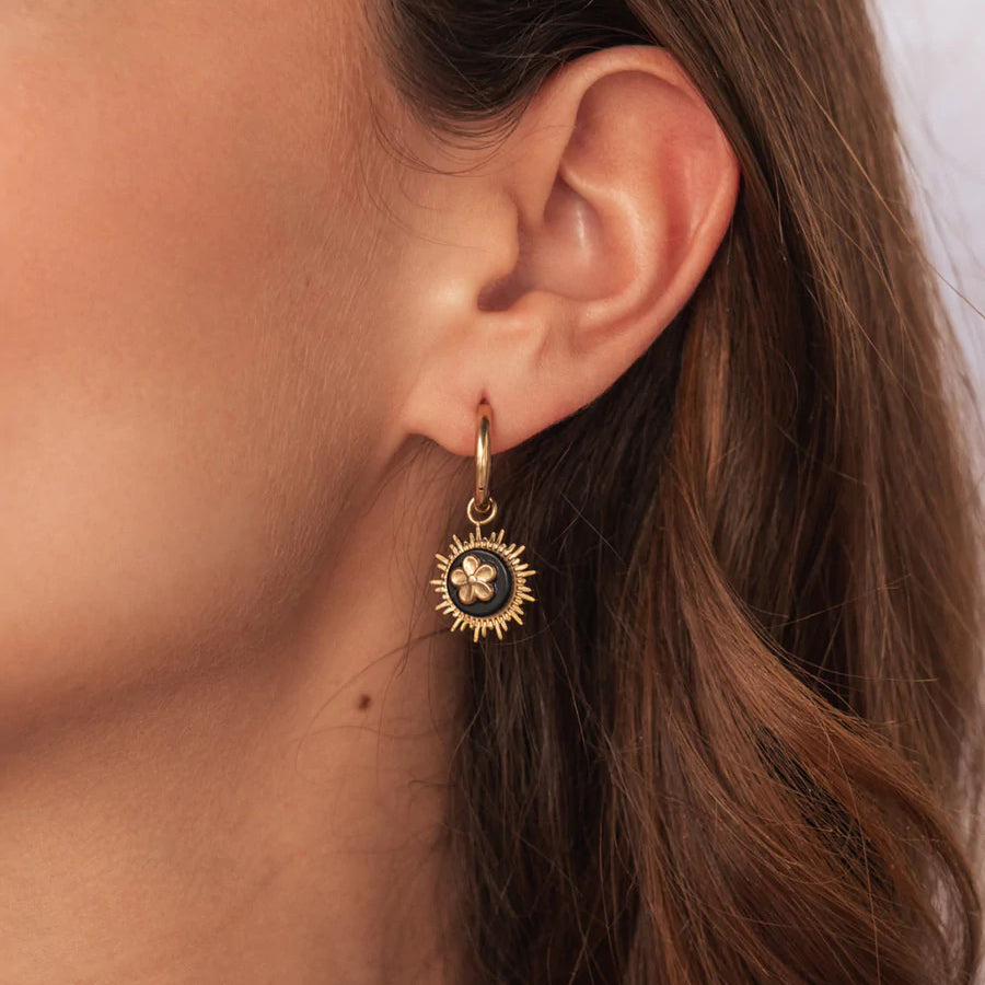 IRL hoops with white agate and warm gold tone, smooth circles and a radiant floral bezel